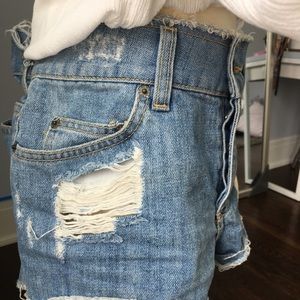 ripped blue jean shorts